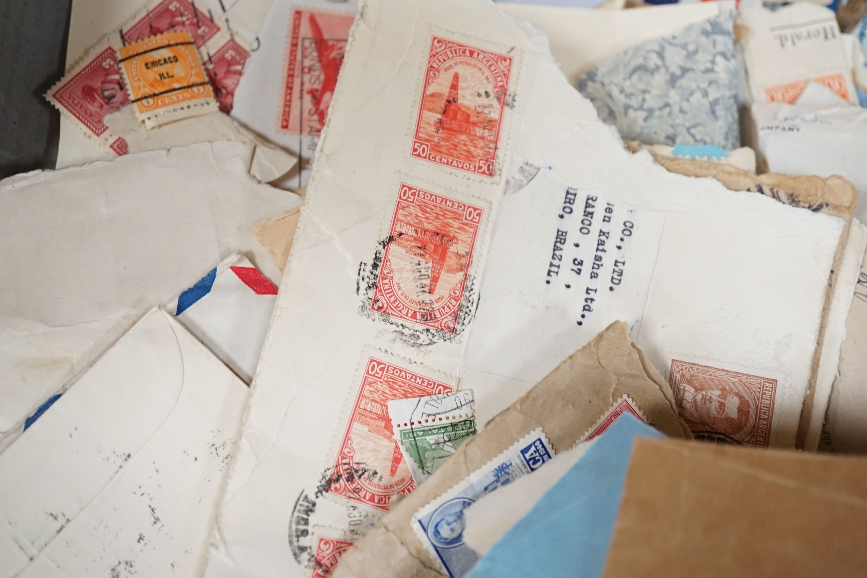 World stamps in folders and loose, empty album. Mostly 1930s -1950s with covers, WWII interest, Canada, France